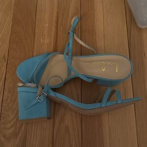 Blue strappy heels